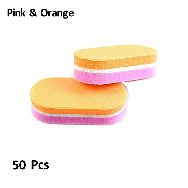 A pack of 50 pink and orange dual-grit nail buffing blocks.
