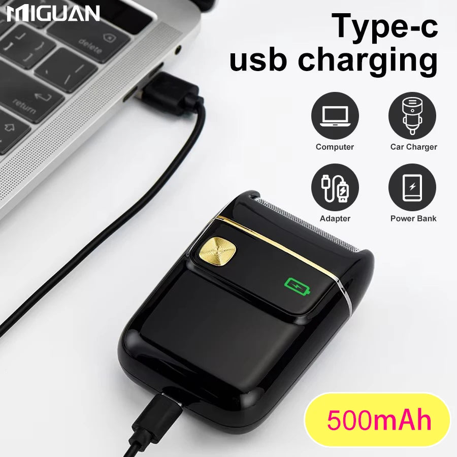 A black portable Type-C USB charging power bank with a green indicator light and a charging cable.