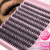 A pink plastic kit containing 200 pairs of black natural and wispy eyelash clusters for eye makeup.