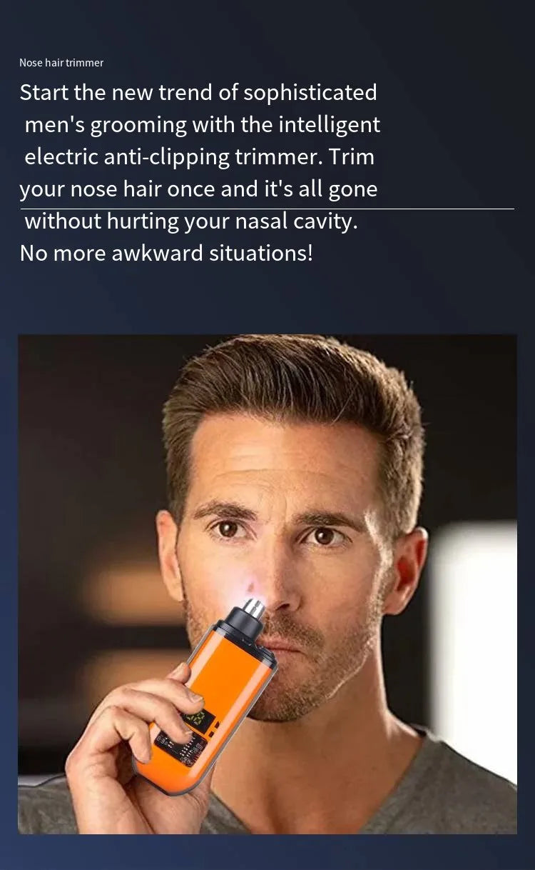 A man is using an orange portable electric nose hair trimmer on his nose.