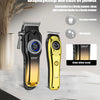 A pair of gold and black HIENA LED LCD smart display electric hair clippers are shown on a marble surface.