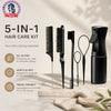 Kit de soins capillaires noir 5-en-1 avec peigne, brosse et outils de coiffage sur une surface de marbre.