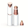 A sleek, cylindrical facial and eyebrow shaver with a rose gold finish is shown standing upright.