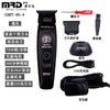 Black MRD GMT-90-4 electric hair clipper with various attachments and accessories