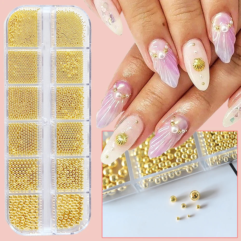 A collection of gold mixed stainless steel bead nail art decorations displayed in an acrylic case and on fingernails.