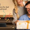 A man is shown receiving a gift box while a woman smiles in the background, with a hair trimmer kit displayed.