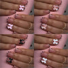 A set of leopard print press-on nails shown in various shades and designs on hands.