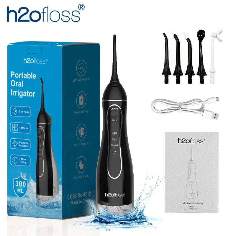 A black portable oral irrigator device with a clear box and accessories displayed on a blue water background.