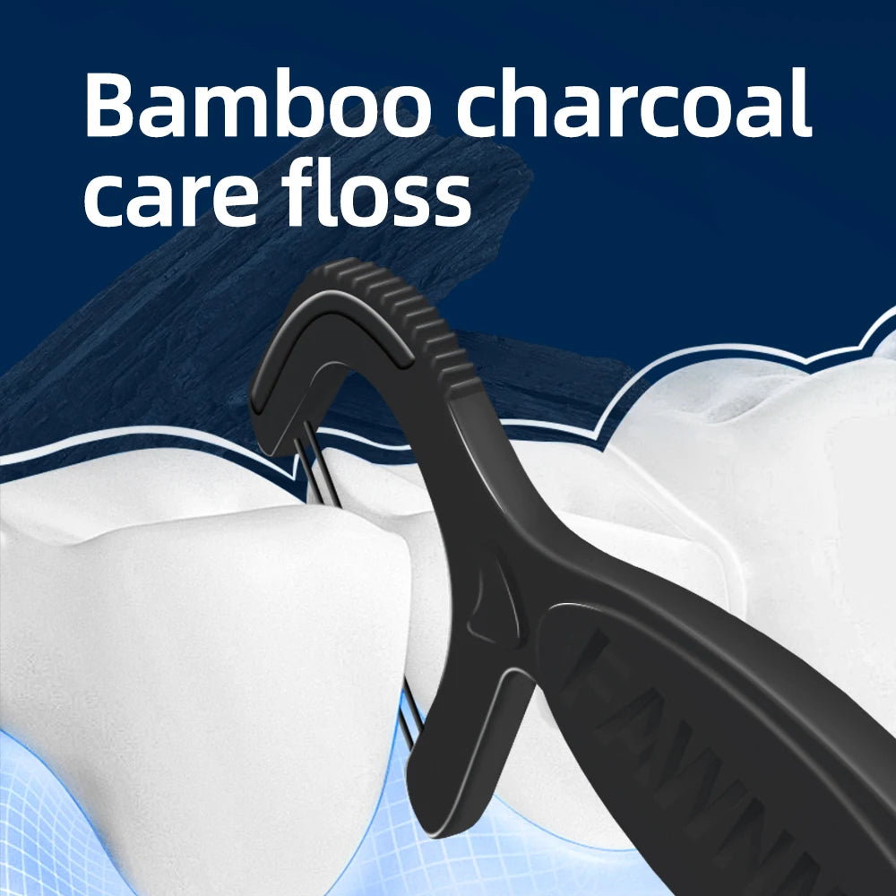 A black bamboo charcoal care floss is shown next to white dental floss in a close-up view.
