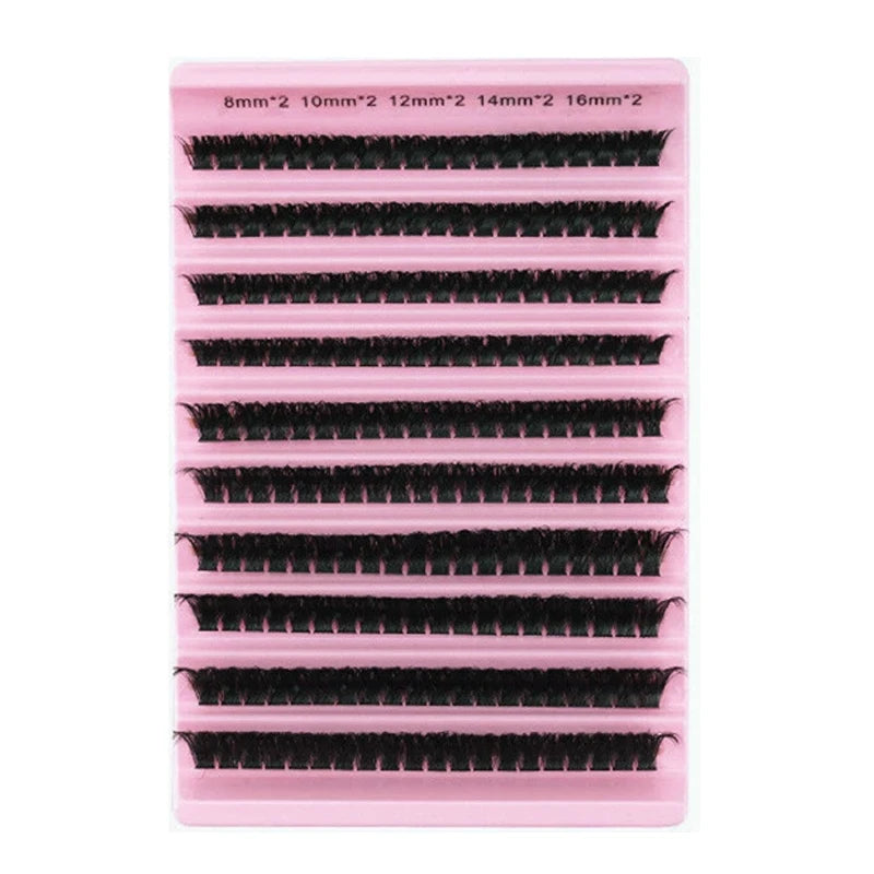 A pink plastic tool with multiple rows of eyelash extensions for curling and styling.