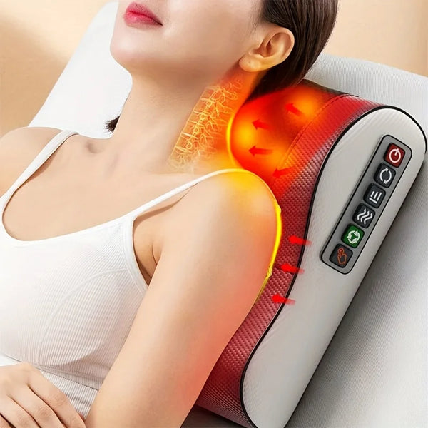 A woman is using a deep kneading massage pillow with soothing heat on her neck and shoulder.
