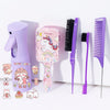 A purple hair styling kit featuring a hairdryer, brush, and comb with unicorn designs and various accessories.