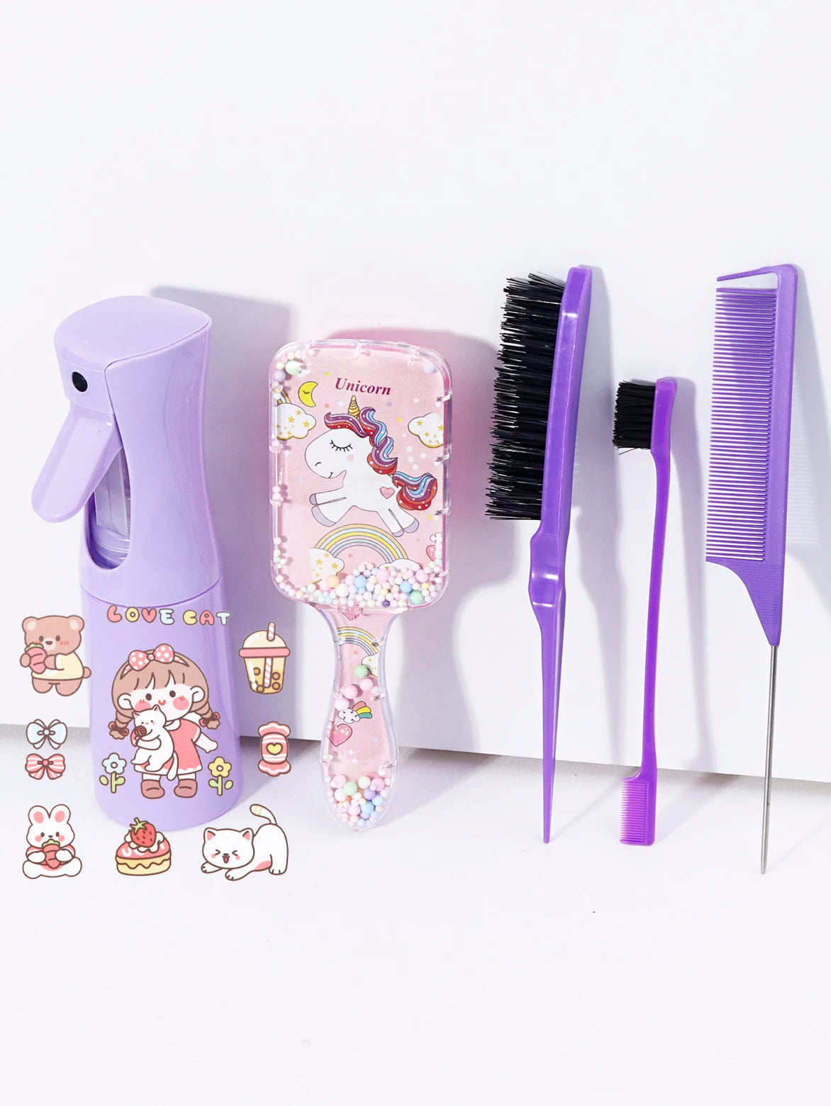 A purple hair styling kit featuring a hairdryer, brush, and comb with unicorn designs and various accessories.