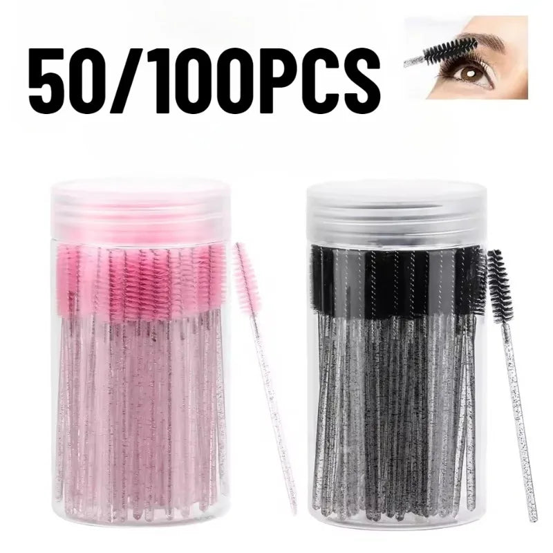 A set of 50 or 100 disposable eyelash and eyebrow makeup brushes in pink and black.