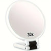 A white portable dual-sided makeup mirror with a 30x magnification lens and a clamp.