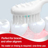 Kit de brosse à dents multi-fonction jetable blanche avec racloir pour aligneurs dentaires.