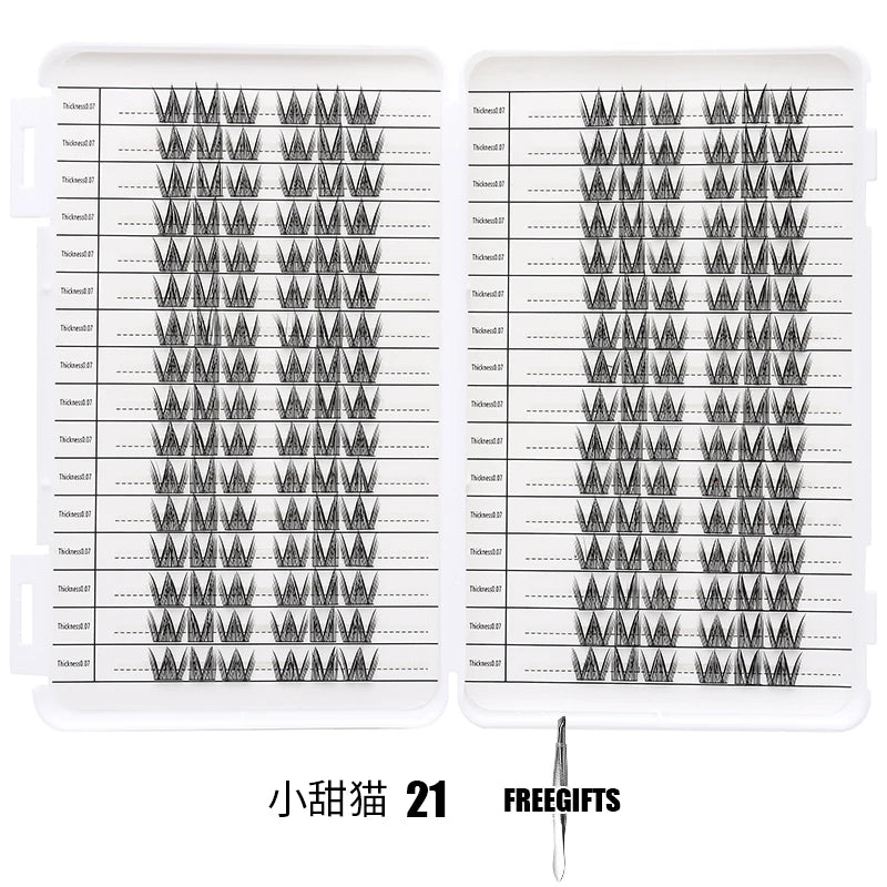 Un kit d'extensions de cils individuels, montrant plusieurs modèles de cils et un petit outil.