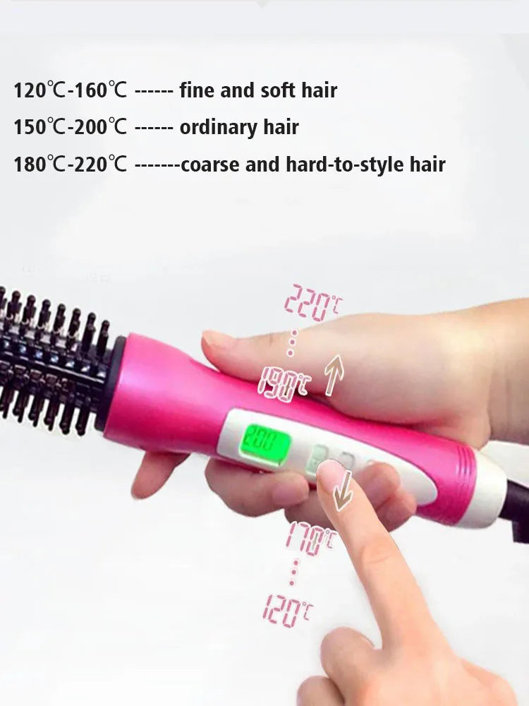 A hand is using a pink hair straightener to style hair, demonstrating different temperature settings.