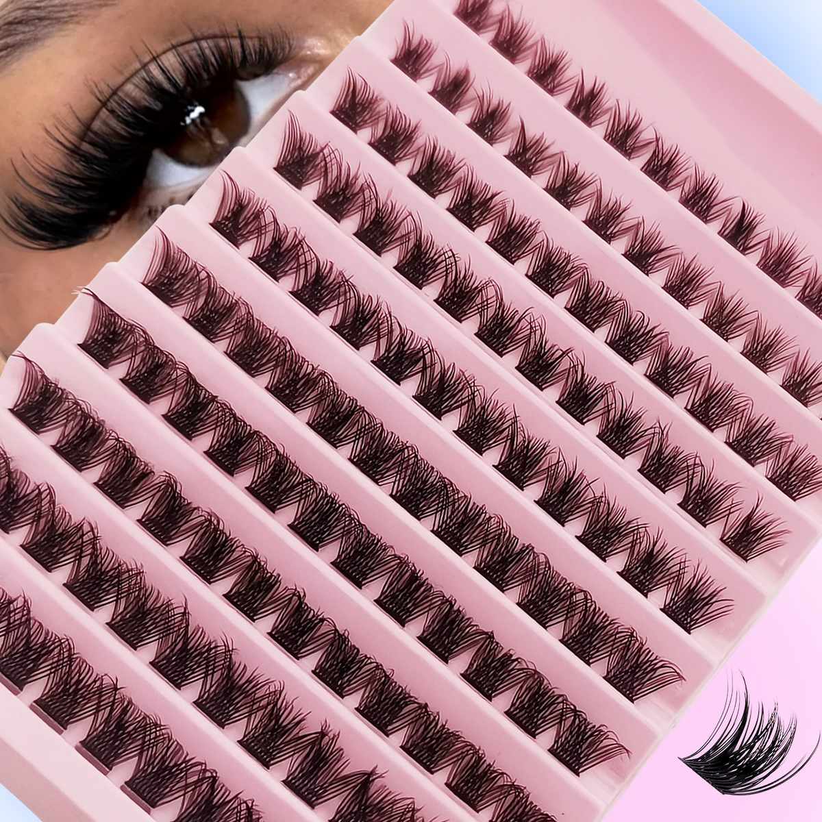 Close-up of a pink lash curler with multiple rows of black false eyelashes and a single lash.