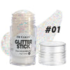 Un pot en verre du produit Glitter Stick étiqueté #01 à côté d'un récipient en verre ouvert.