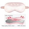 Pink silk eye mask with a padded design and a cross-section showing layered materials.