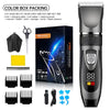 A set of professional electric hair clippers and accessories including a main clipper, guards, and various attachments.