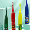 A yellow sonic electric toothbrush with a green handle and blue bristles displayed on light teal pedestals.