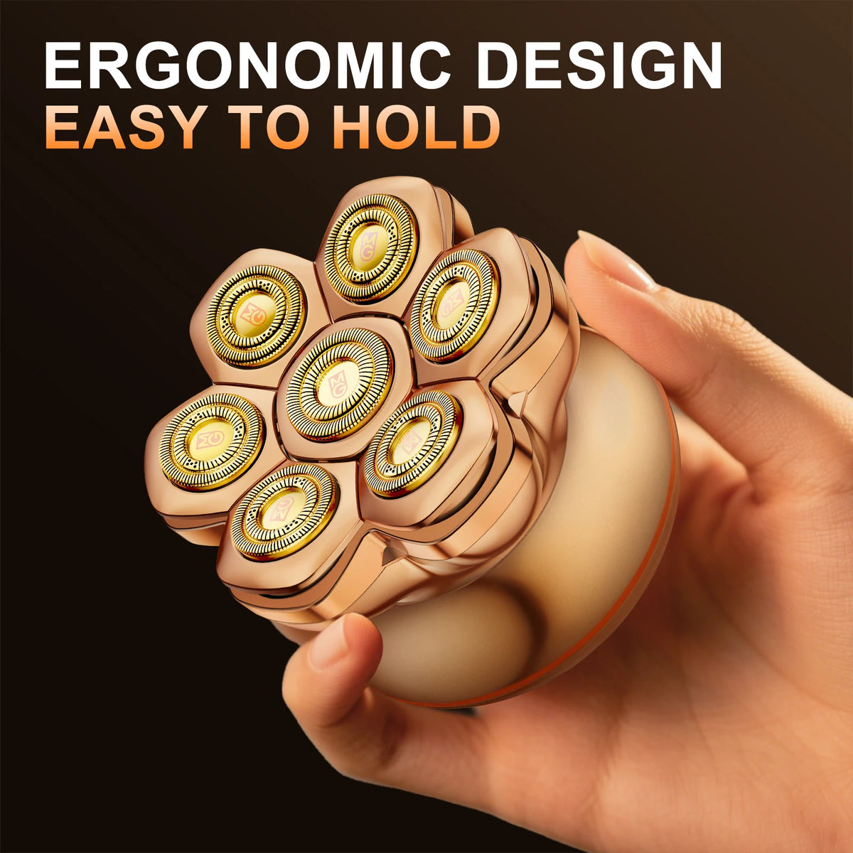 A hand holds a rose gold rotary electric head shaver with multiple shaving heads.