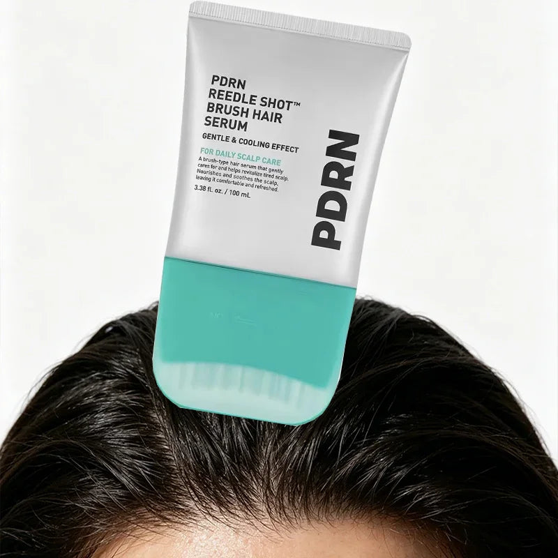 A tube of PDRN Reedle Shot Brush Hair Serum for daily scalp care shown on a person's head.