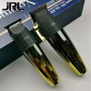 A pair of black and gold professional rechargeable hair clippers with cool blade technology displayed on a box.