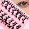 Close-up of pink wet look manga false eyelashes showing various styles and volume