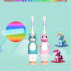 Three cute unicorn-themed electric toothbrushes with colorful flashing lights against a light blue background.
