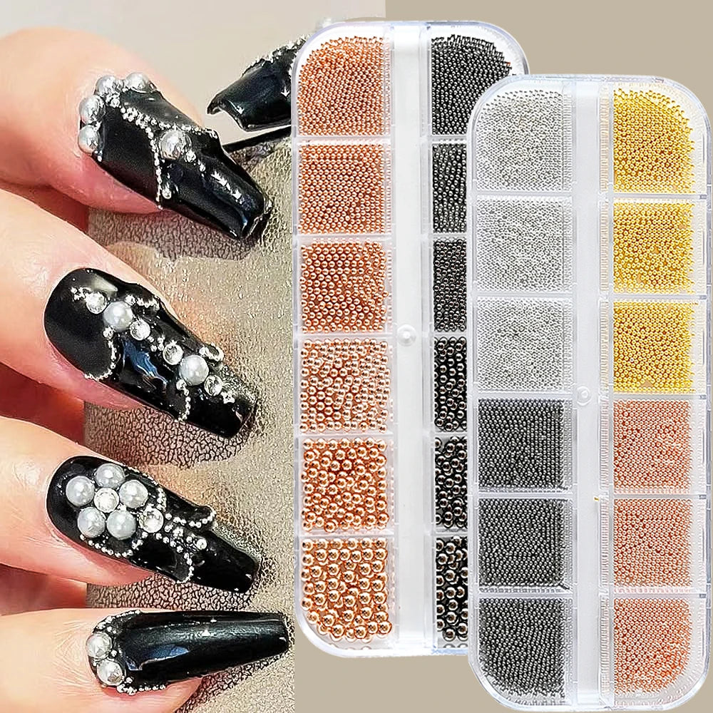 A set of gold mixed stainless steel bead nail art decorations in various shades and sizes displayed on a clear plastic case.