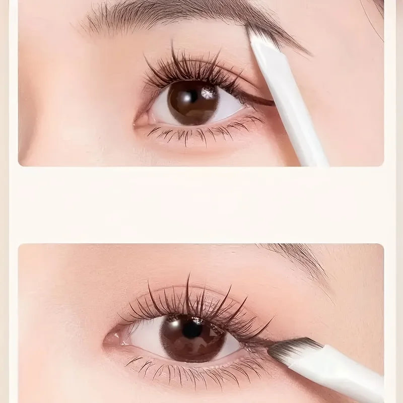 Close-up of an eye being applied with a professional makeup brush set for detailed eye makeup application.