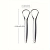 A pair of portable stainless steel tongue scrapers with a handle and loop.
