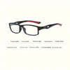 Gafas deportivas para leer anti-luz azul negras con acentos rojos sobre fondo blanco.