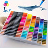 A set of 12 dual-head art markers in various vibrant colors arranged in a plastic case, with a blue whale silhouette above.