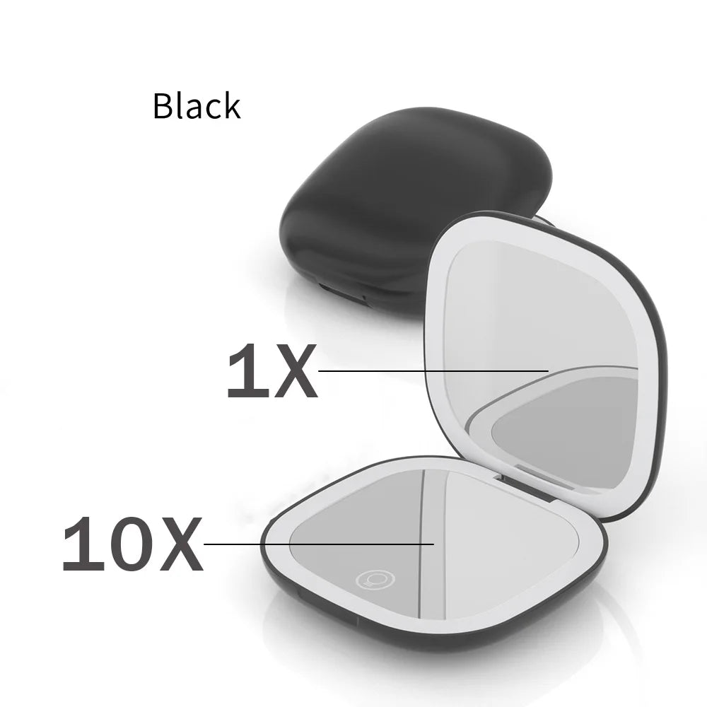 Black compact LED makeup mirror showing 1X and 10X magnification settings.