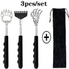 A set of three stainless steel telescopic back scratchers with black handles and a matching travel pouch.