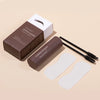A brown box and tube of Ibccanc Eyebrow Powder with a brush and stencils displayed on a light background.