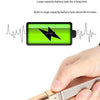 A hand holds a gold-colored electric hair remover device, next to a battery icon graphic.