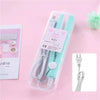A clear plastic case containing a light blue hair curler and straightener tool with a cord.