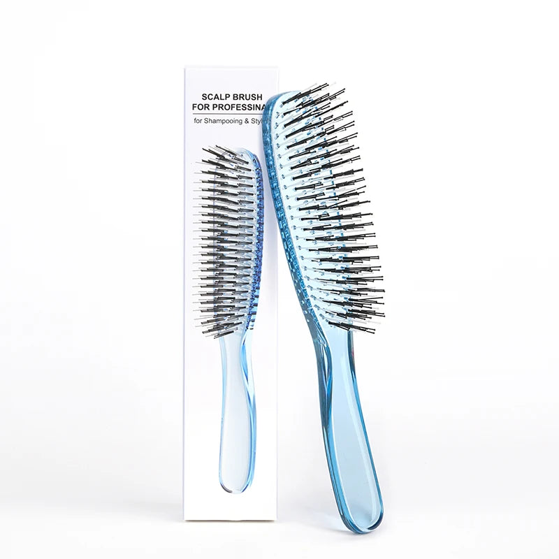 A light blue scalp brush for professional hair detangling and styling is shown next to its packaging.