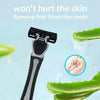 A close-up of a stainless steel safety razor with a replaceable triple-blade head is shown next to a sliced green lime.