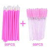 A set of 100 disposable pink eyelash and eyebrow brushes, divided into two groups of 50 pieces.