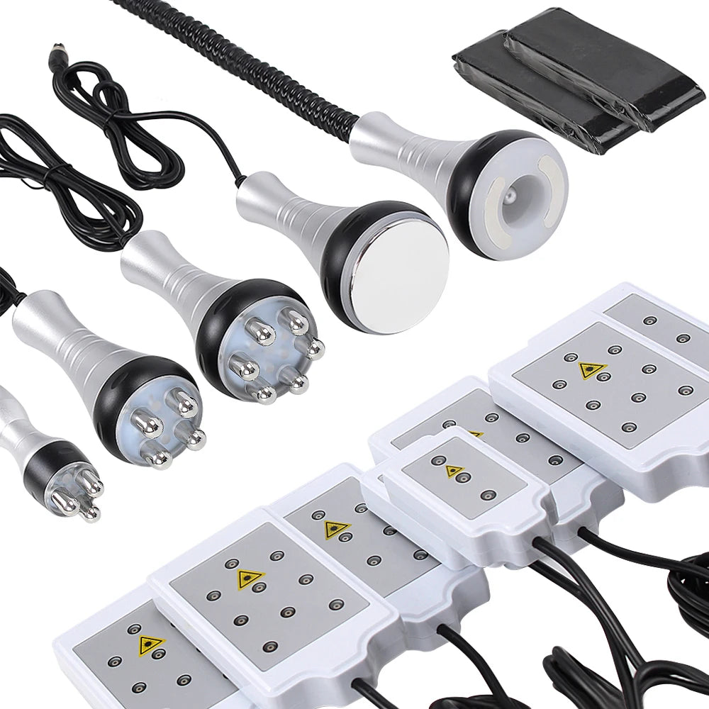 Various ultrasonic body sculpting massager tools and attachments shown on a white background.