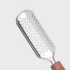 A stainless steel foot file with a perforated surface and a pink handle for callus removal.