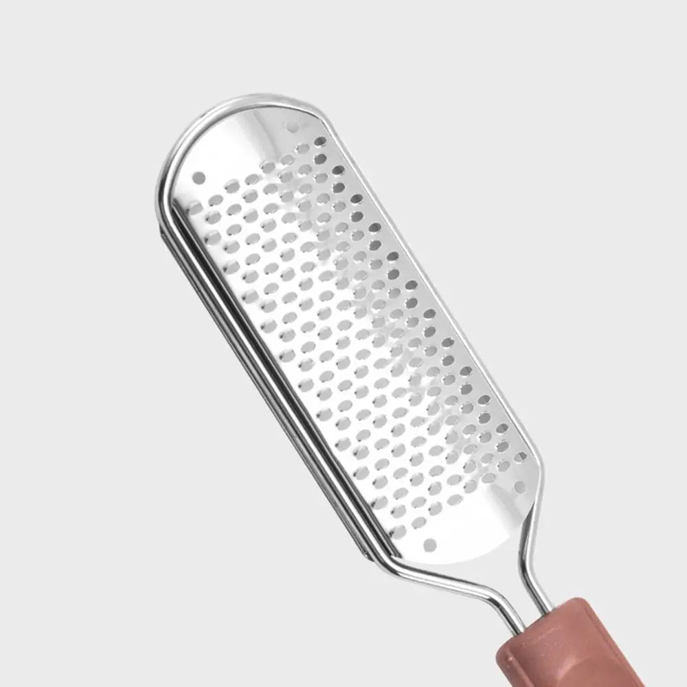 A stainless steel foot file with a perforated surface and a pink handle for callus removal.