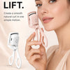 A woman is using a pink heated eyelash curler to create lash lift. The device is shown alongside the woman's eye area.