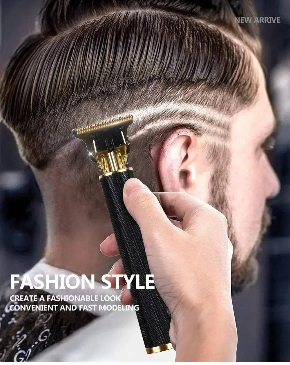 A hand uses a professional hair clipper to create a fade haircut on a man's side.